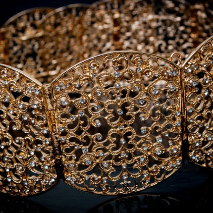 Gouden ovalen riem