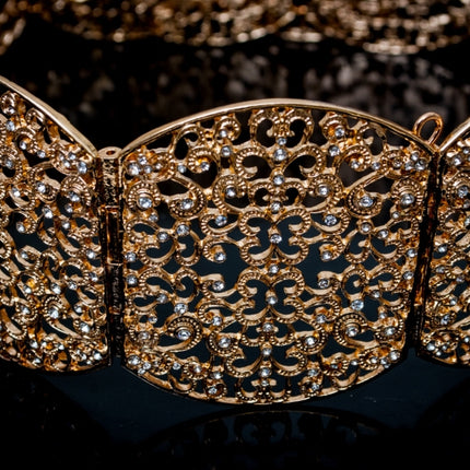 Gouden ovalen riem