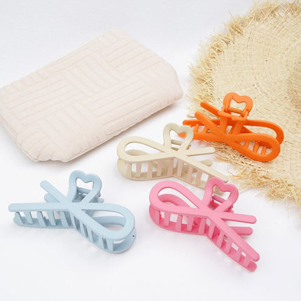 Haarclip Krullende Golven - Plastic Haarspeld - 11 cm - Roze