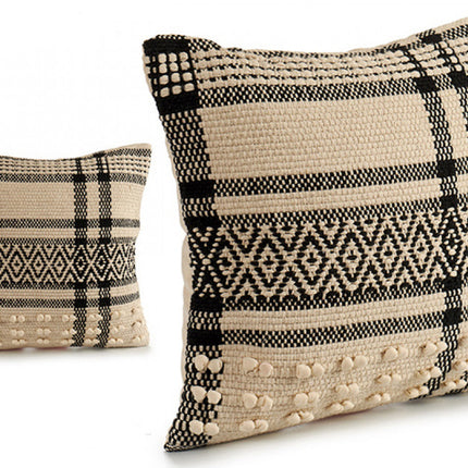 Gebreid katoenen kussen met beige en zwarte motieven