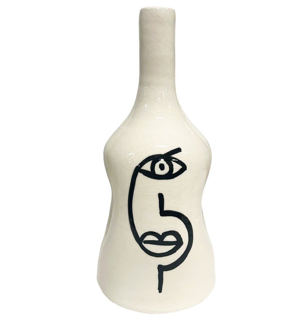 Earthenware vase face white black