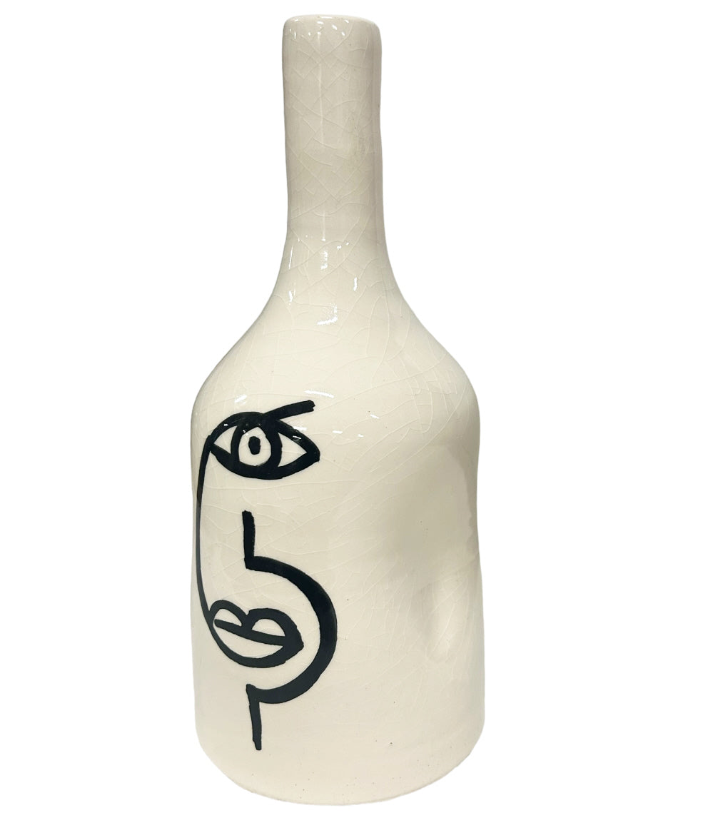 Earthenware vase face white black